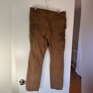 Distressed Carhartt pants